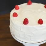 wee hacks her wedding cake - white cake with berries and whipped cream frosting